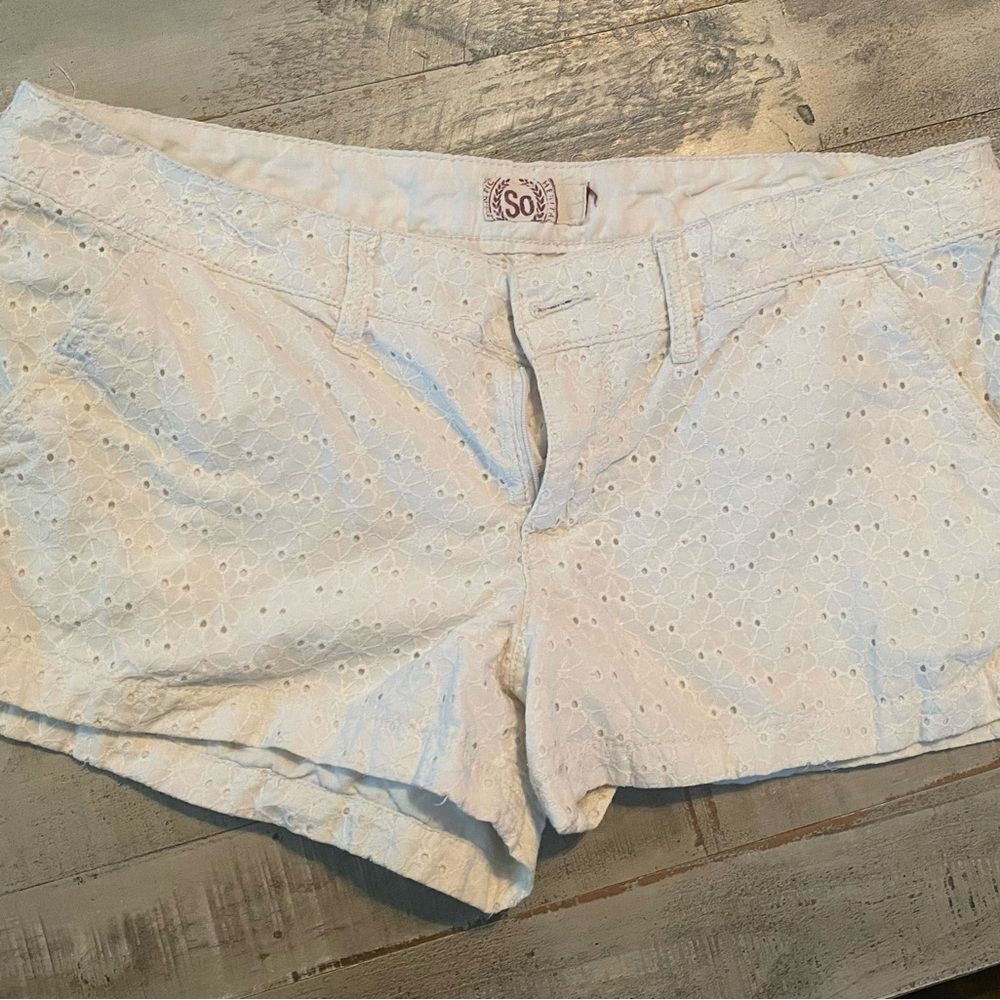 White eyelet shorts by So